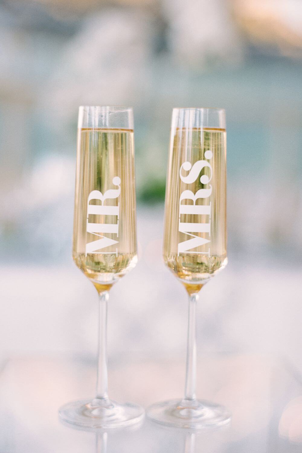 Mr and Mrs glasses of champagne